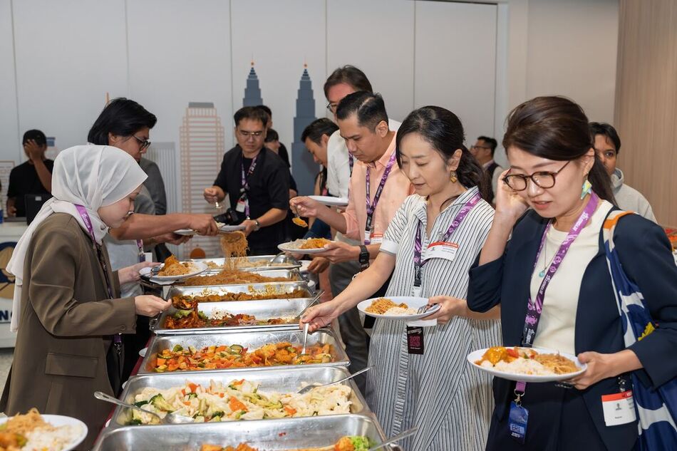 Attendees serving themselves at the BeyondFest 2025 lunch buffet