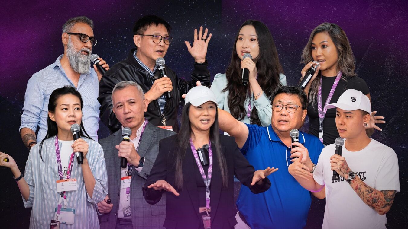 The BeyondFest 2026 speaker line-up on a purple cosmic backdrop, each holding a microphone